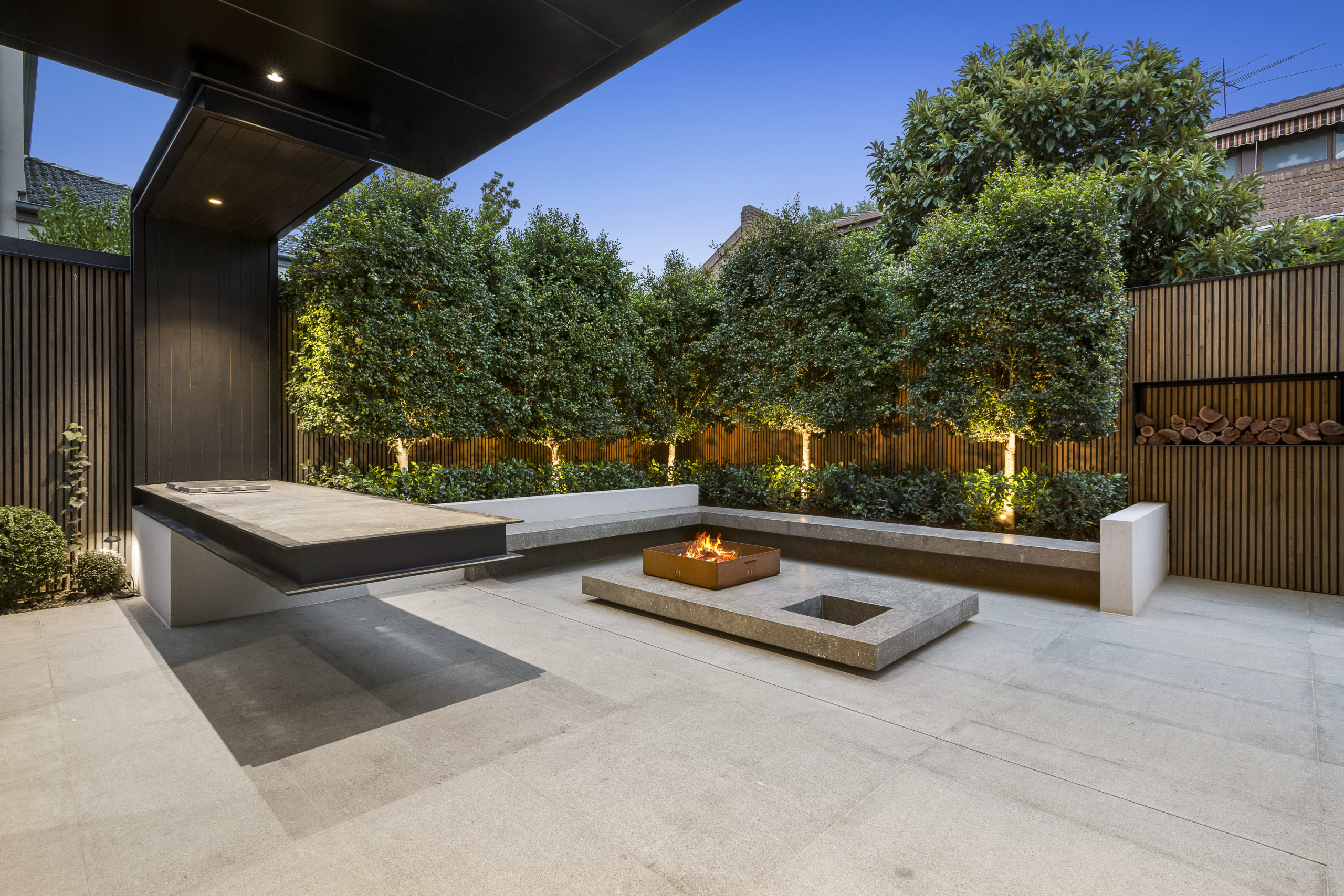 Expert hardscape design solutions concrete patio and fireplace