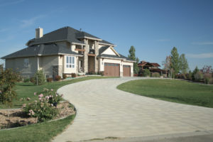 edge your driveway with natural river rocks